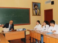 KAZAKİSTAN'DA FERRUH YÜCEL HOCAMIZ'A TEŞEKKÜR BELGESİ VERİLDİ