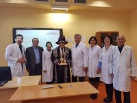 KAZAKİSTAN'DA FERRUH YÜCEL HOCAMIZ'A TEŞEKKÜR BELGESİ VERİLDİ