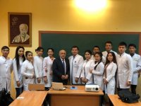 KAZAKİSTAN'DA FERRUH YÜCEL HOCAMIZ'A TEŞEKKÜR BELGESİ VERİLDİ