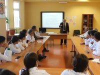 KAZAKİSTAN'DA FERRUH YÜCEL HOCAMIZ'A TEŞEKKÜR BELGESİ VERİLDİ